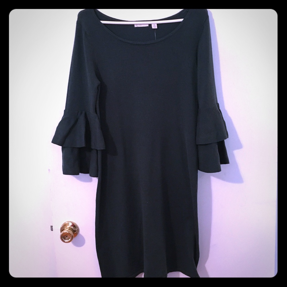 Dark green dress with ruffled sleeves